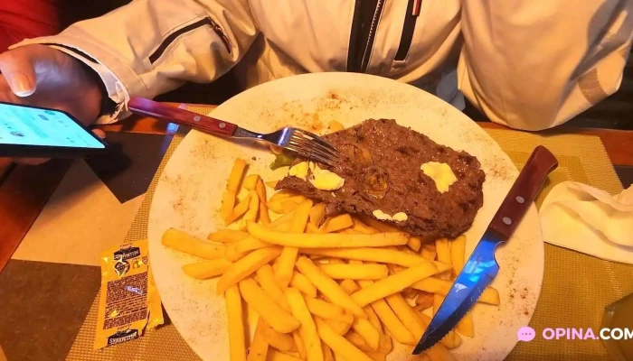 La Pizzarrita -  Milanesa - Montevideo