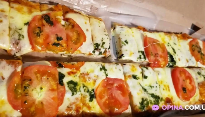 Pizzeria Romanela Comida Y Bebida - Pajas Blancas