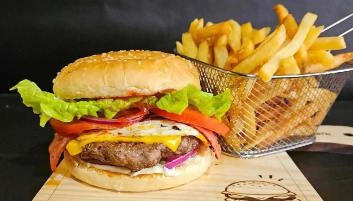 Rotiseria Y Pizzeria Nuestras Delicias Comida Y Bebida - Atlántida