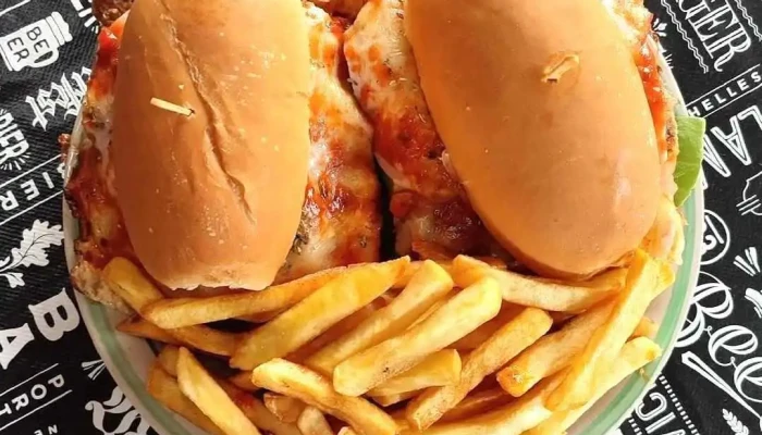 Troperos Pizzeria Y Rotiseria Comida Y Bebida - Minas