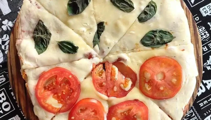 Troperos Pizzeria Y Rotiseria Pizza - Minas